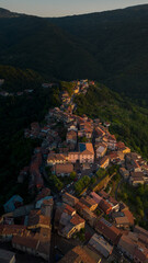Panoramic aerial view with drone of Martirano in Calabria on sunset.