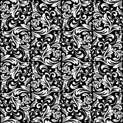 Floral pattern. Vintage wallpaper in the Baroque style. Seamless vector background. White and black ornament for fabric, wallpaper, packaging. Ornate Damask flower ornament.