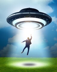 Flying saucer abducting young businessman