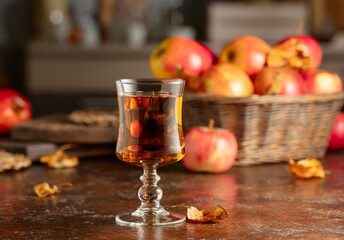 Apple juice on an old kitchen table.