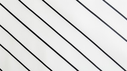 Fototapeta premium A close-up shot of a white surface with diagonal black lines running across it.