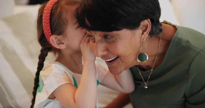 Child, whisper and secret for woman in home, living room and shy girl gossip with grandmother. Ear, listening and kid talking to grandma with privacy about drama, rumor or opinion on story in house