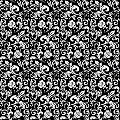 Floral pattern. Vintage wallpaper in the Baroque style. Seamless vector background. White and black ornament for fabric, wallpaper, packaging. Ornate Damask flower ornament.