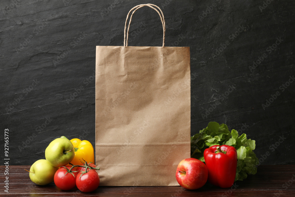 Canvas Prints Delivery of vegetarian products. Different vegetables, fruits and paper bag on wooden table