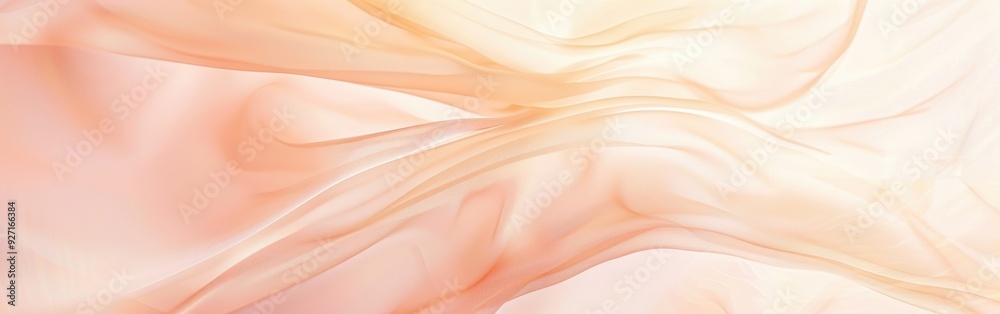 Poster a piece of peach-colored fabric drapes softly, creating flowing folds and a delicate texture. the fa