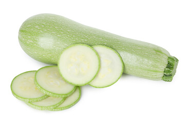 Fresh whole and cut zucchinis isolated on white, top view