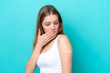 Teenager Russian girl wearing a band aids isolated on blue background with surprise and shocked facial expression