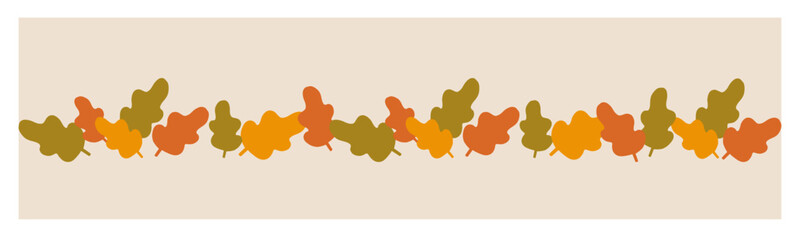 Autumn leaves in shades of orange, yellow, and green against a light background