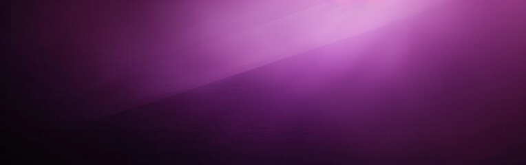 Fototapeta premium A close-up view of fog rolling over a distant mountain range as the sun sets, casting the sky in a vibrant purple hue. The fog creates a soft, ethereal effect, obscuring the details of the mountains i