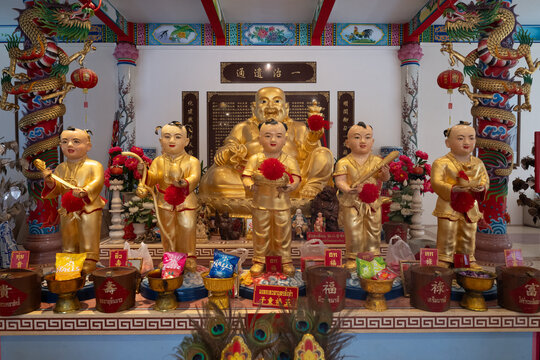 Chachoengsao, Thailand, June 04, 2024, Wat Cheen Pracha Samosorn (Wat Leng Hok Yi), Colorful Chinese Shrine with Golden Statues.