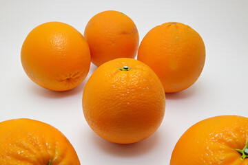 A white with oranges and other fruits. Fresh juice slice concept. A white with oranges, oranges, and other citrus fruits. A of oranges and whites with citrus lifestyle.