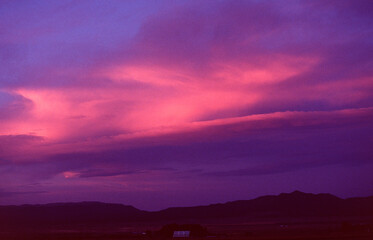 time clouds over sunset
