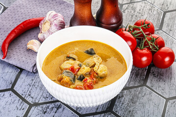 Traditional yellow Thai curry with chicken