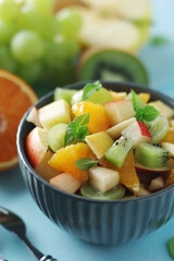 A bowl with fresh fruit	