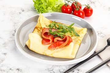 Russian pancake with salmon fish