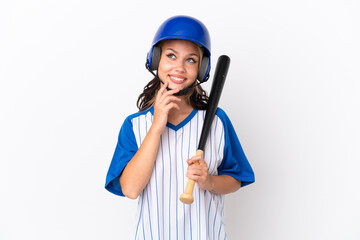 Baseball Russian girl player with helmet and bat isolated on white background looking up while smiling