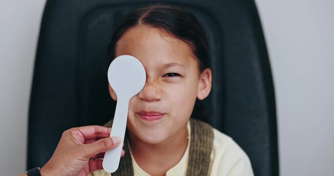 Eye exam, face and optometrist cover child vision for optical consultation, check and girl reading for eyesight test. Ophthalmology, optometry and portrait kid examination, feedback or assessment