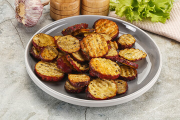 Baked red batat slices with herbs