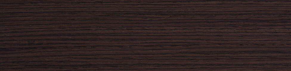 Naklejka premium Midnight espresso wenge veneer captivates with its linear texture, blending tones of dark chocolate and deep auburn