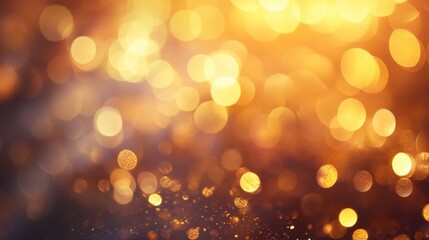 Obraz premium Abstract background with blurred golden lights, representing joy, celebration, success, warmth, and happiness.