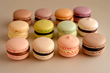 sweet beautiful macaroons close up on white backgroundc