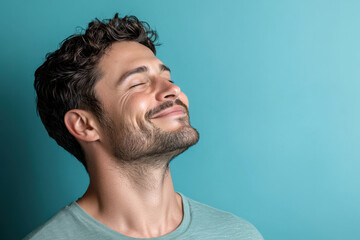 Fototapeta premium A close up of a man's face with her eyes closed