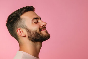 Fototapeta premium A close up of a man's face with her eyes closed