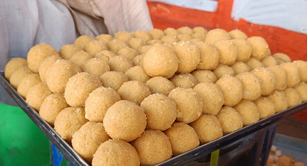 Besan ladoo or laddu are delicious sweet balls made with gram flour, sugar, ghee cardamoms, indian mithai