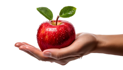 Hand holding fresh apple with splash of water on white or transparent background