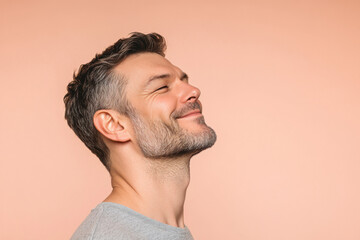 Obraz premium A close up of a man's face with her eyes closed