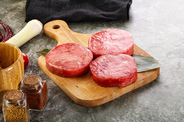 Delicous raw tuna medallion for cooking
