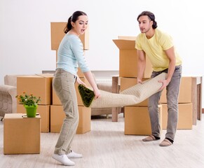 Young pair moving to new apaprtment