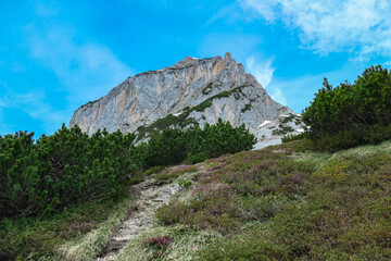 Panoramic view of majestic mountain peak Sinabell and Wasenspitze in Schladming, Schladminger Tauern, Styria, Austria. Hiking trail in Austrian Alps in spring. Remote alpine landscape. Wanderlust