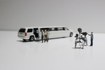 movie making of small figure at the white background