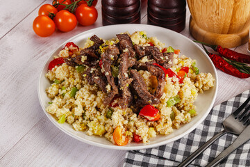Traditional couscous with beef and vegetables