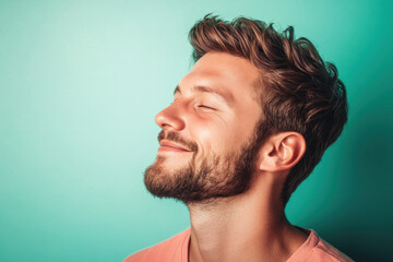 Fototapeta premium A close up of a man's face with her eyes closed