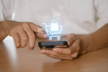 Online shopping, E-commerce and digital marketing concept. person using a smartphone to make an online purchase, with digital shopping icons in the background.