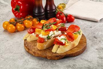Bruschetta tapas with chorizo and tomato