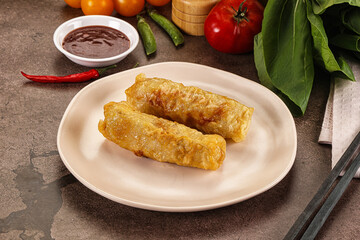 Vietnamese stuffed spring roll served sauce