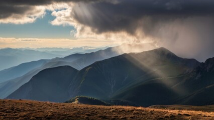 Dramatic Clouds Over Sunlit Mountain Ridge
