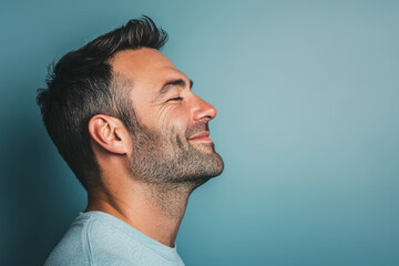 Obraz premium A close up of a man's face with her eyes closed