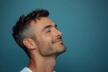 Fototapeta premium A close up of a man's face with her eyes closed