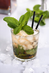A refreshing mint julep cocktail. Made with bourbon, fresh mint and a hint of sweetness, this is the perfect drink for summer gatherings.