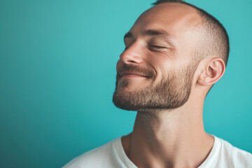 Obraz premium A close up of a man's face with her eyes closed