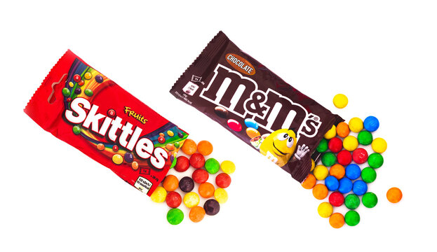 Skittles and M&Ms (by Mars) fruit dragee on white