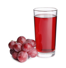 Tasty juice in glass and fresh grapes isolated on white
