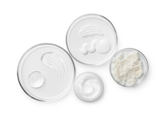 Petri dishes with different cosmetic products isolated on white, flat lay