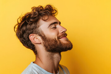 Fototapeta premium A close up of a man's face with her eyes closed