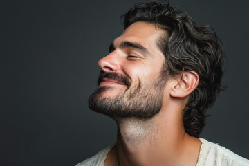 Fototapeta premium A close up of a man's face with her eyes closed