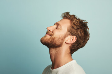 Fototapeta premium A close up of a man's face with her eyes closed